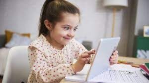 woman reading an interesting blog on laptop