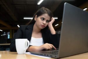 female blogger wondering how many blog post should she write to get traffic to her site