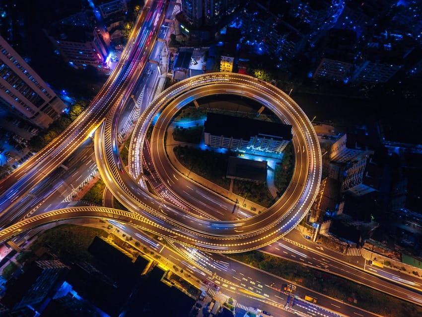 blogger using drone to take photo of traffic exchange